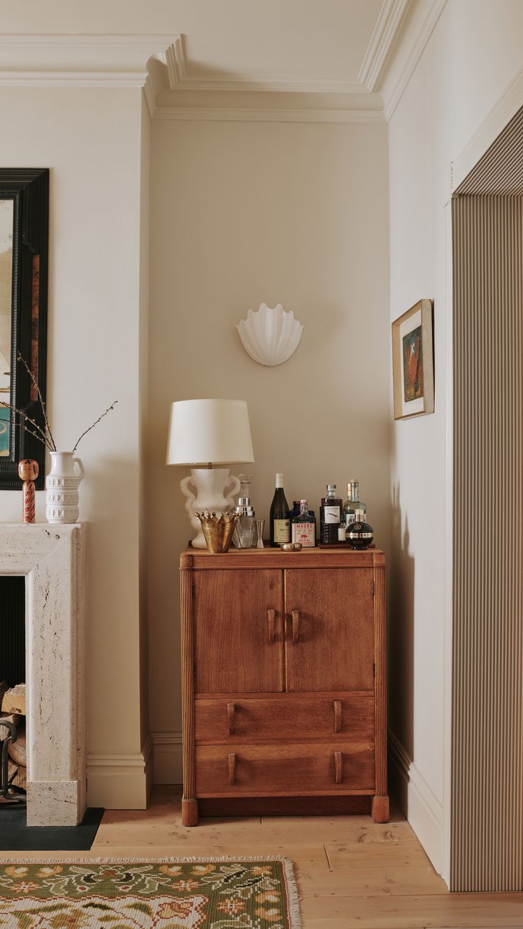 Image may contain Indoors Fireplace Living Room Room Interior Design Hearth and Furniture