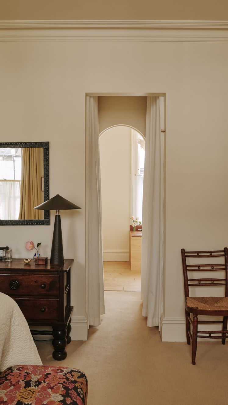 Image may contain Furniture Chair Wood Flooring Hardwood Floor Interior Design Indoors Room and Living Room