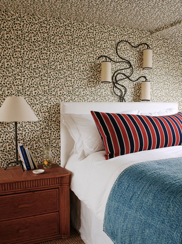 Image may contain: Furniture, Room, Bedroom, Indoors, Cushion, Lamp, Table Lamp, Bed, Living Room, Pillow, and Couch