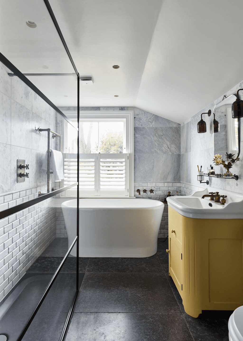 Image may contain Indoors Room Bathroom Tub Bathtub and Shower