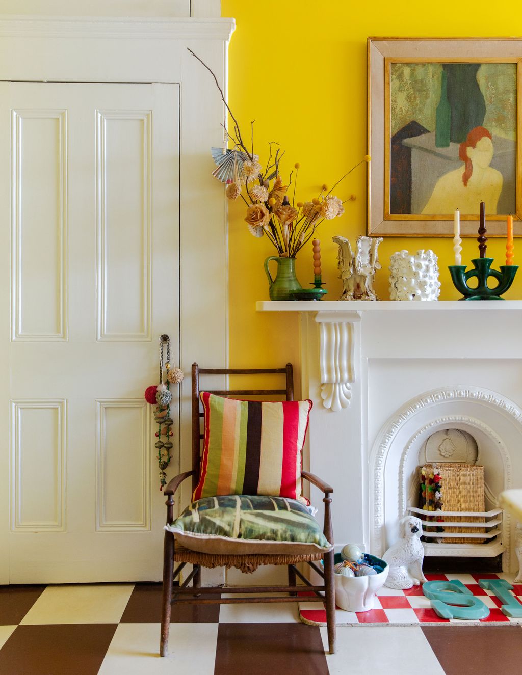 Image may contain Interior Design Indoors Furniture Living Room Room Plant Flower Blossom Ikebana and Ornament