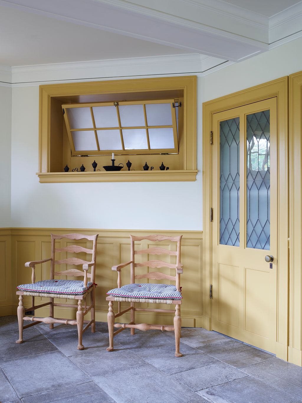 Image may contain Furniture Chair Home Decor Interior Design Indoors Corner Room and Door