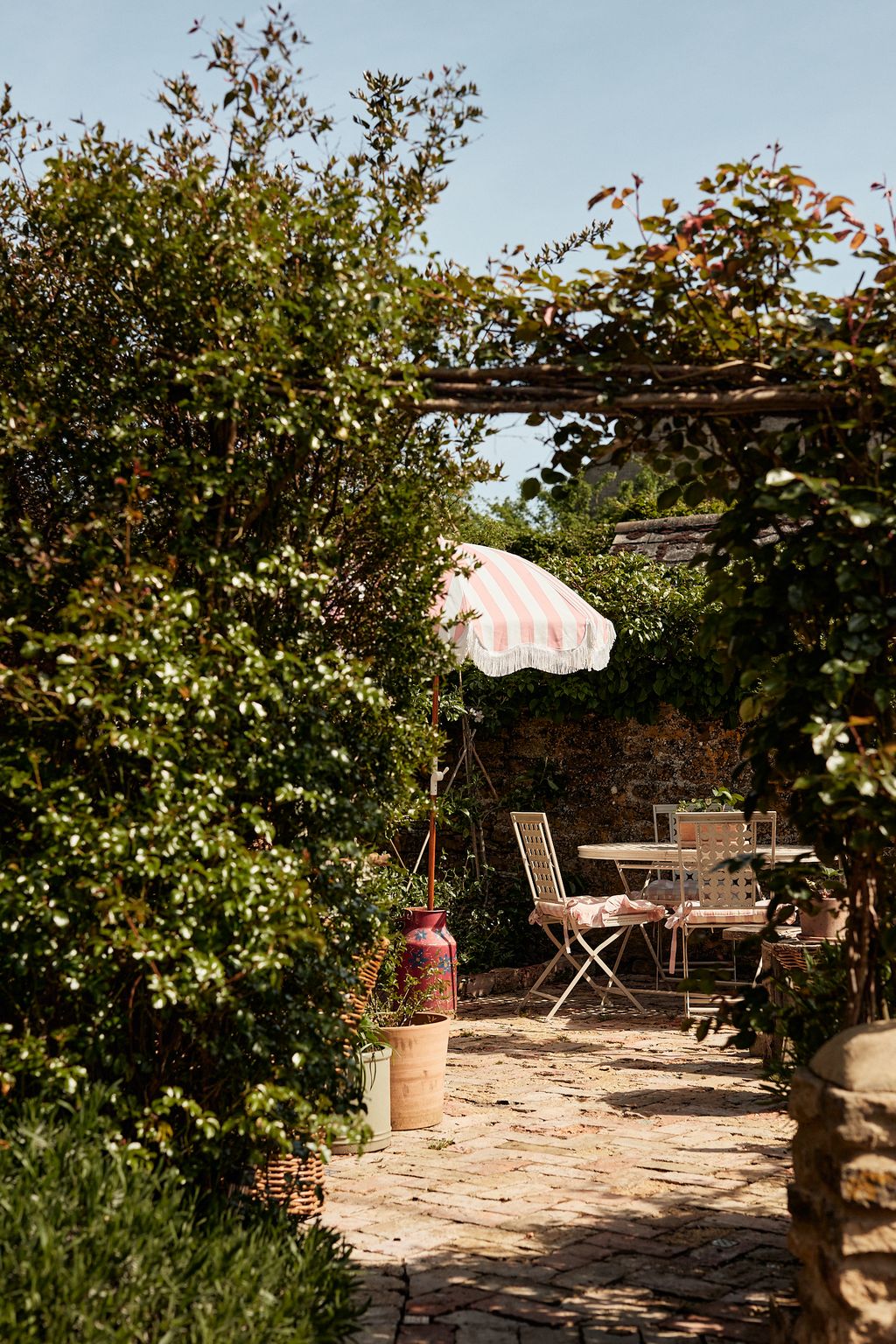 Image may contain Furniture Chair Patio Porch Outdoors and Pergola