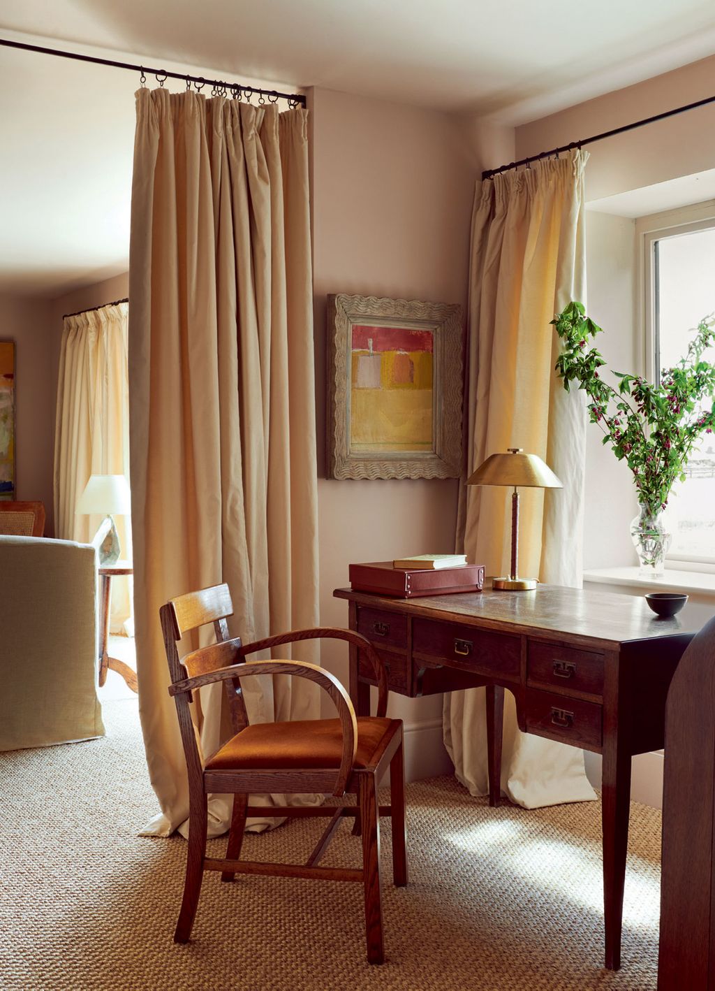 Image may contain Furniture Chair Table Living Room Room Indoors Desk Electronics Screen Monitor Display and Wood