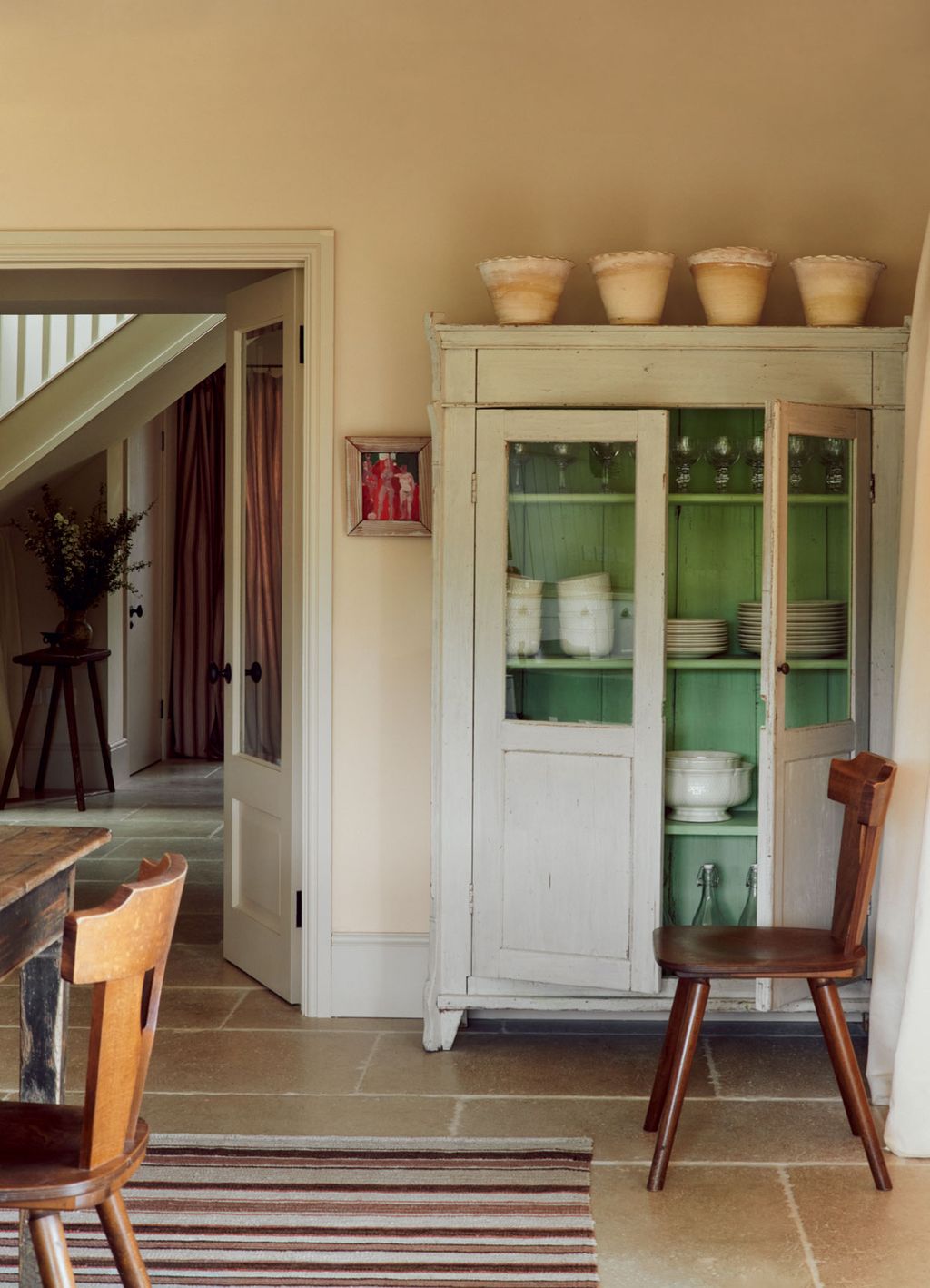 Image may contain Furniture Wood Flooring Floor Hardwood Chair Cabinet China Cabinet Cupboard Closet and Plywood