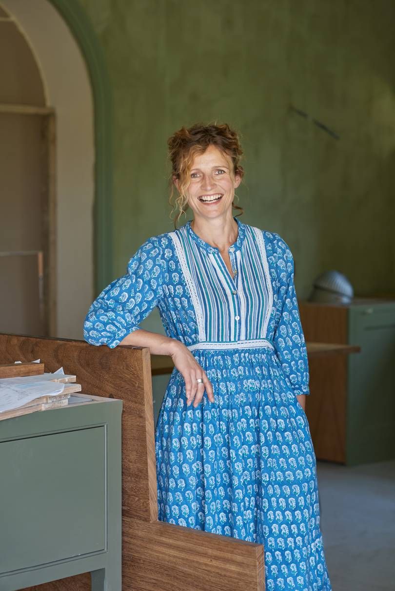 Image may contain Clothing Apparel Dress Human Person Evening Dress Gown Robe and Fashion