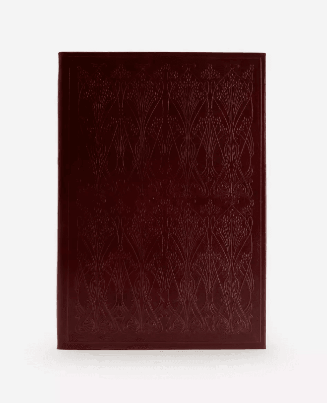 Image may contain Rug and Maroon