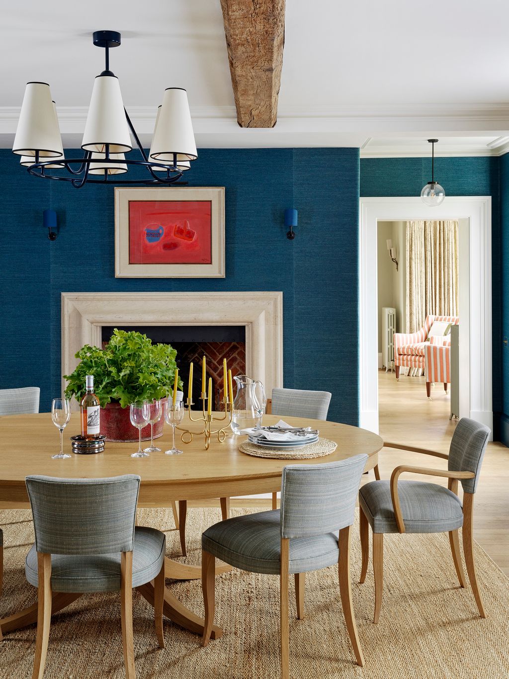 Image may contain Furniture Chair Room Indoors Dining Room Interior Design Dining Table Table Wood and Living Room