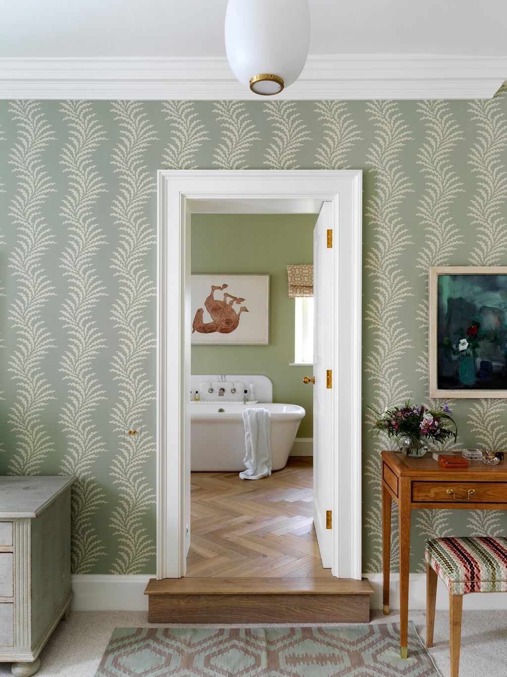 Image may contain Corner Flooring Wood Furniture Interior Design Indoors Floor Room Hardwood and Living Room