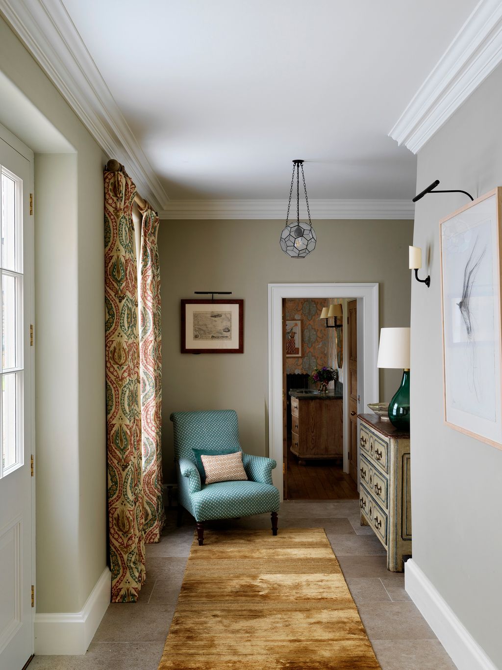 Image may contain Flooring Wood Floor Furniture Hardwood Living Room Room Indoors Interior Design Corner and Rug