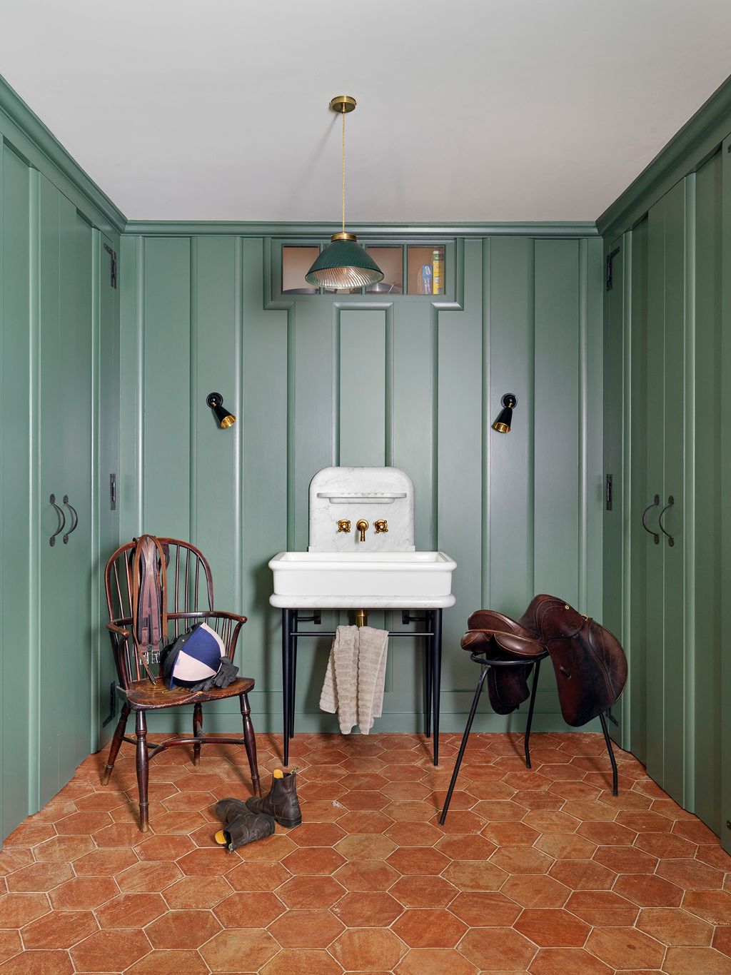 Image may contain Flooring Furniture Chair Floor Interior Design Indoors Wood Hardwood Lighting and Rug