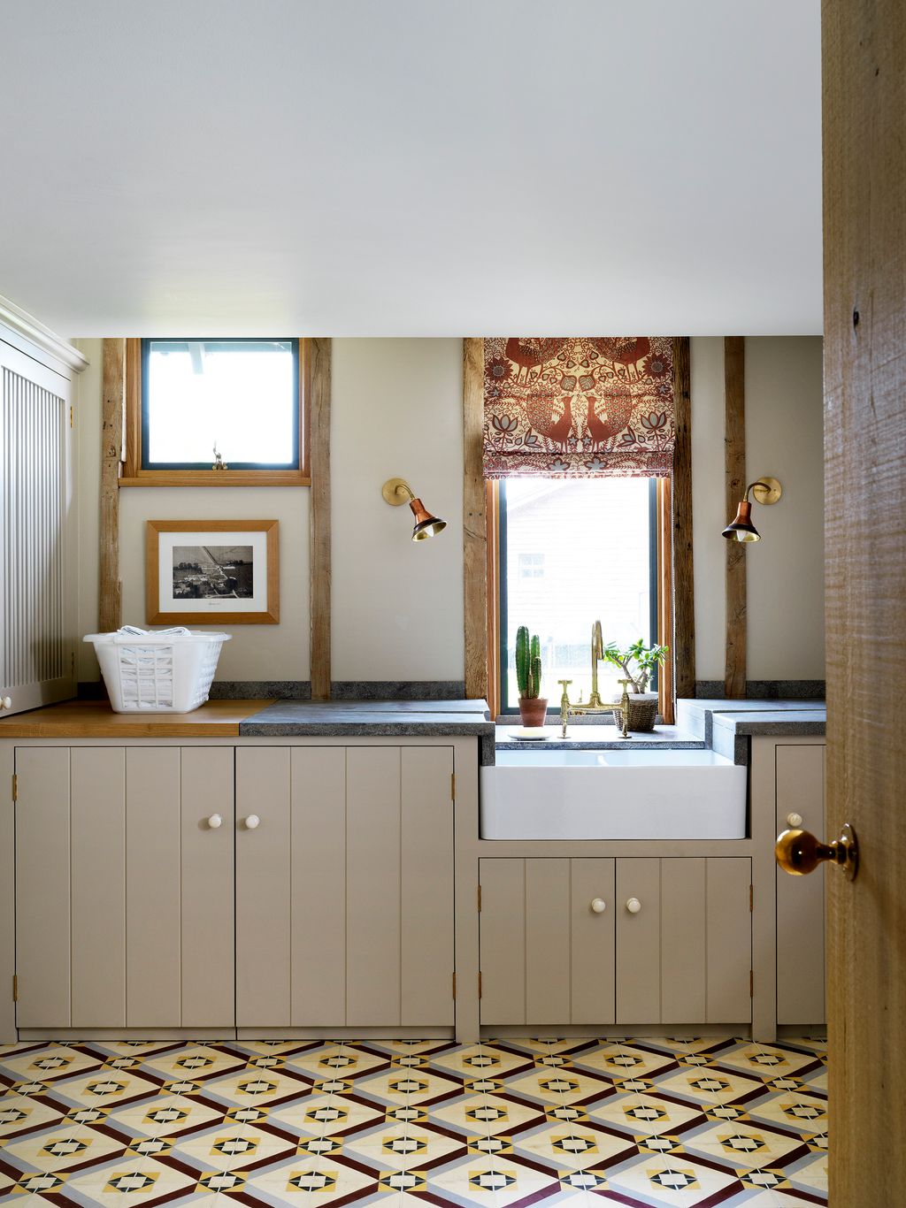 Image may contain Flooring Furniture Interior Design Indoors Room Rug Floor Corner and Wood