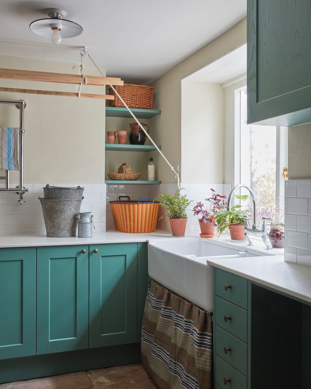 Image may contain Furniture Indoors Room Interior Design Shelf Kitchen Cupboard and Closet