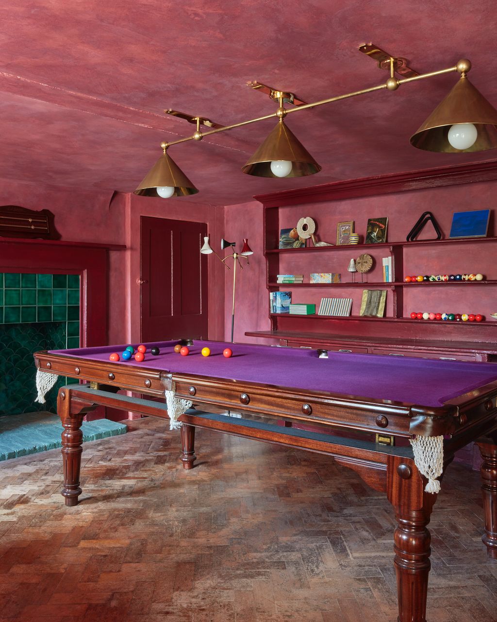Image may contain Furniture Indoors Room Table Pool Table and Billiard Room