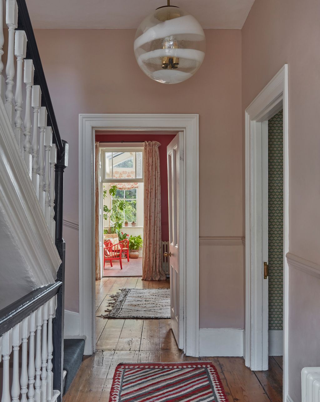 Image may contain Flooring Floor Banister Handrail Wood Hardwood Interior Design Indoors and Railing
