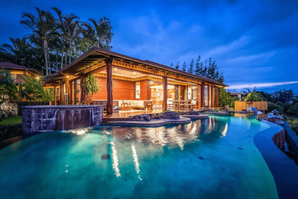 Image may contain Building Resort Hotel Water Housing Pool Villa House Swimming Pool Outdoors Nature and Mansion