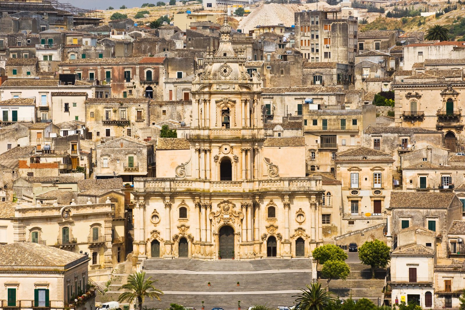 Image may contain City Urban Town Building Downtown Architecture Housing Monastery Metropolis Water and Scenery