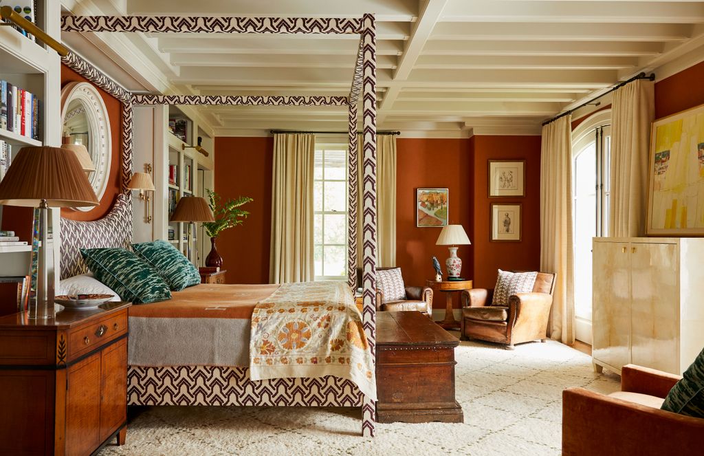 Matthew designed the sleek fourposter with space for a mirror from Jonathan Sainsbury and had the bed frame covered in...