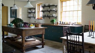 Image may contain Indoors Room Wood Flooring Hardwood Furniture Chair and Kitchen