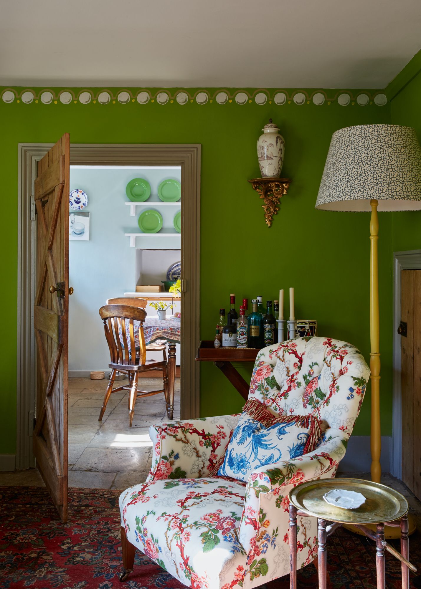 Image may contain Furniture Chair Living Room Room Indoors Lamp Interior Design Couch and Wood