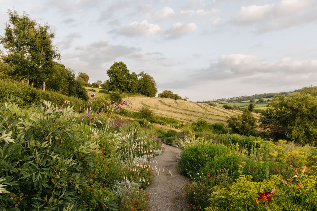 In the perennial garden the planting is designed to peak late so as not to detract from the spring and earlysummer...