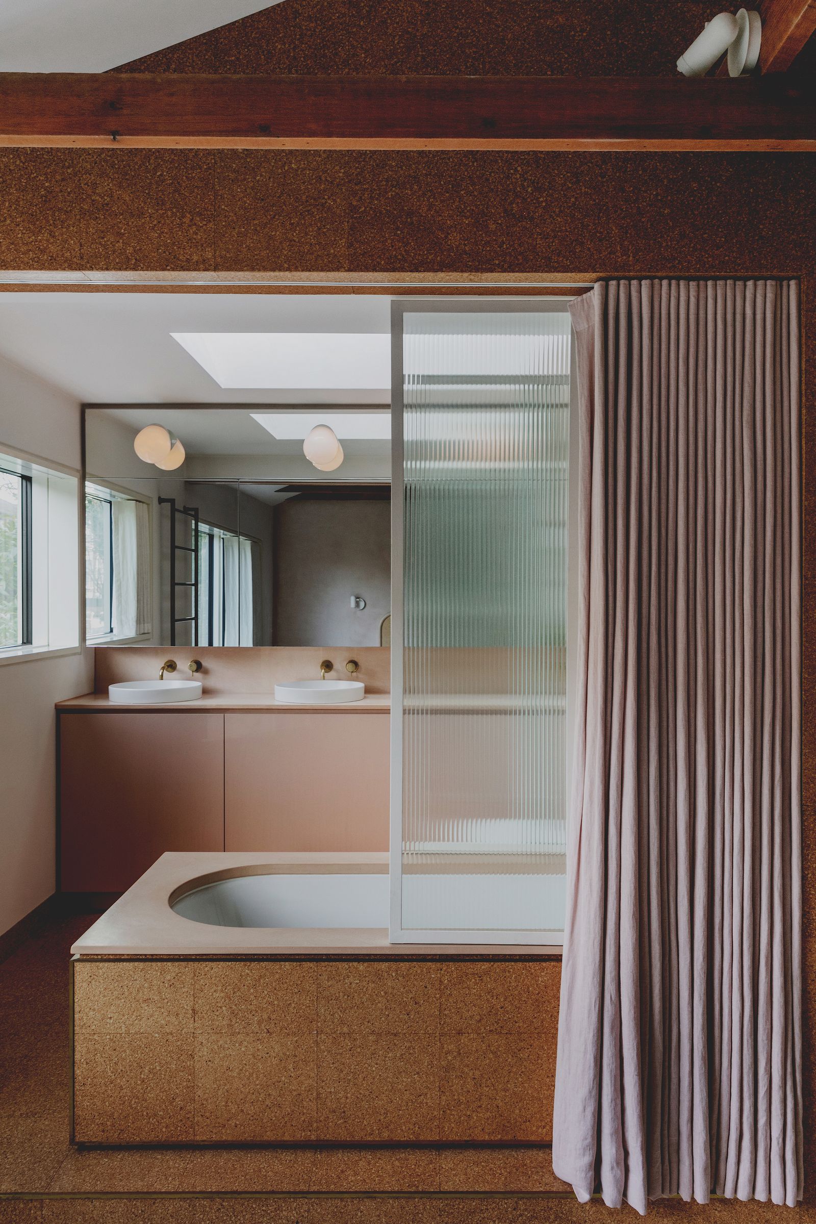 The master bathroom in an LAinthe70s inspired home in Primrose Hill.