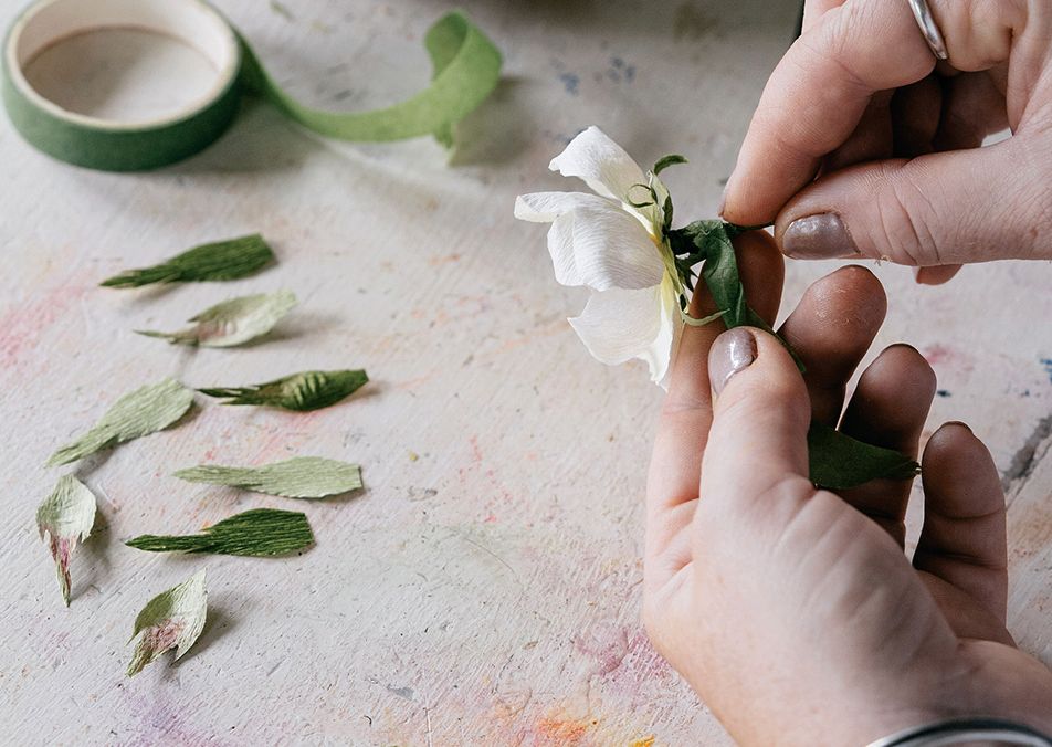 Making the sepals  10. Cut the sepals from outstretched green crepe using the sepal template.  11. Tacky glue their...