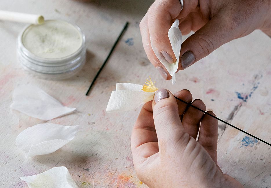 Making the petals  6. Cut petals for the younger flowers from cream crepe using the young petal template. For the older...