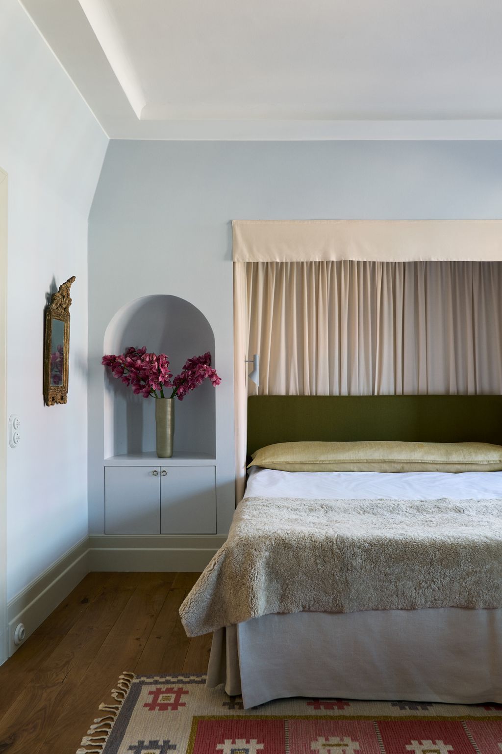 Image may contain Room Bedroom Indoors Furniture Bed Interior Design Flooring and Plant