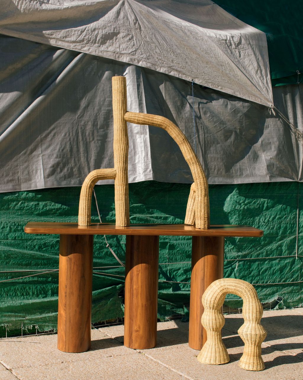 ‘Totem walnut console table 4010 from Siete.  ‘Mangrove XL woven gnoo xomb nisin fibre sculpture  400 ‘Artefacto LS 23...