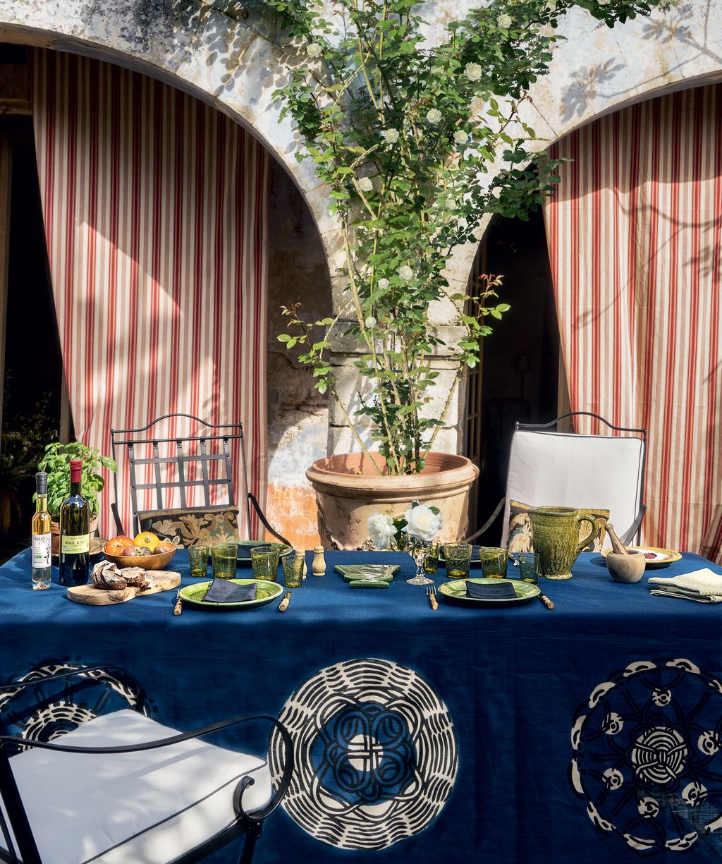 Image may contain Tablecloth Furniture Chair Food Meal Home Decor Restaurant Plant and Cafeteria