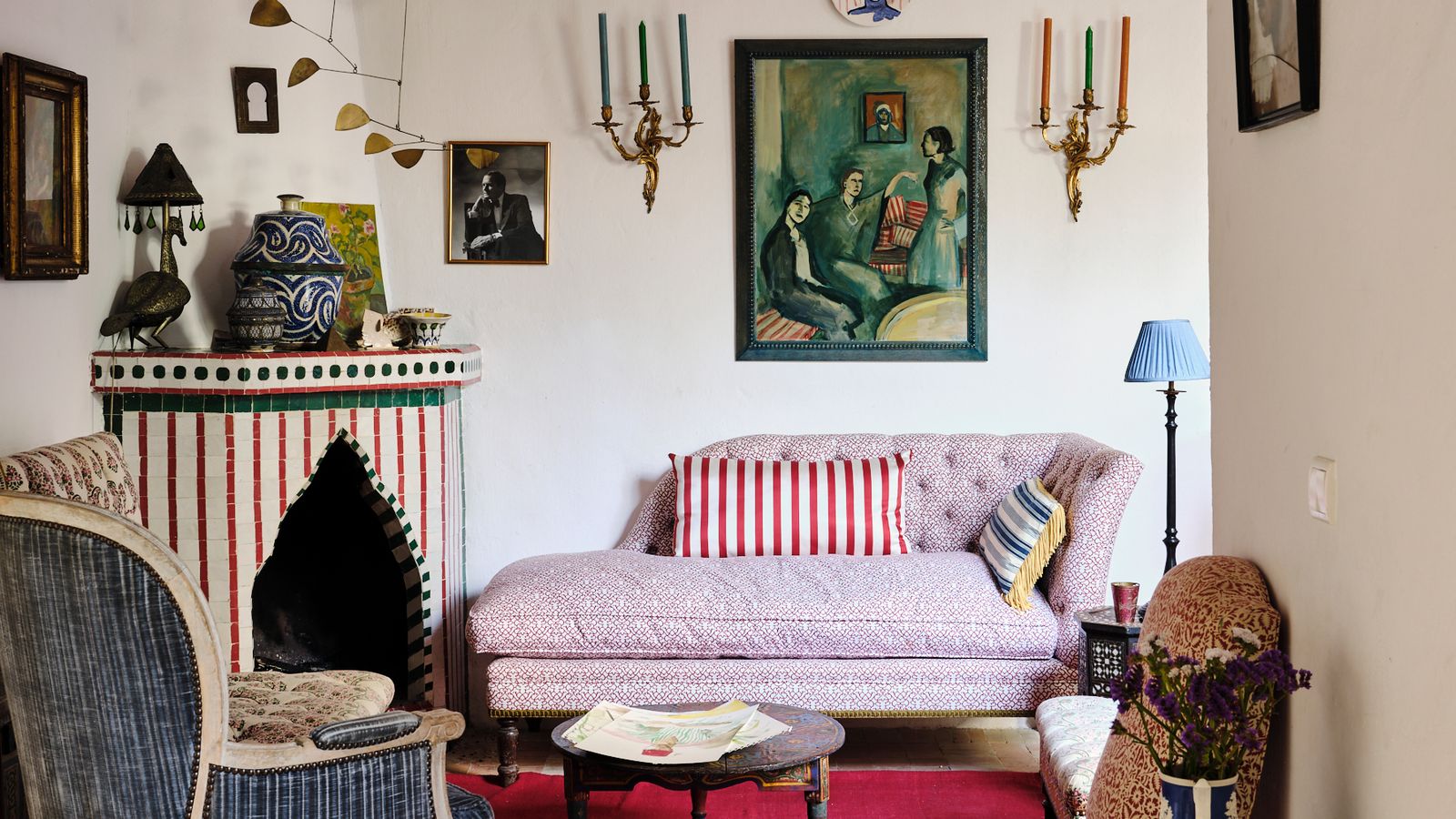 Image may contain: Living Room, Indoors, Room, Furniture, Chair, Interior Design, Cushion, Couch, and Pillow