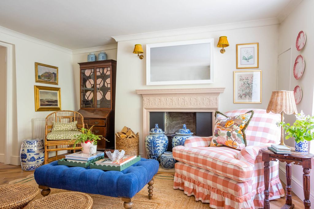All the walls in the cottage are painted in ‘School House White and in the living room the fireplac surround has been...