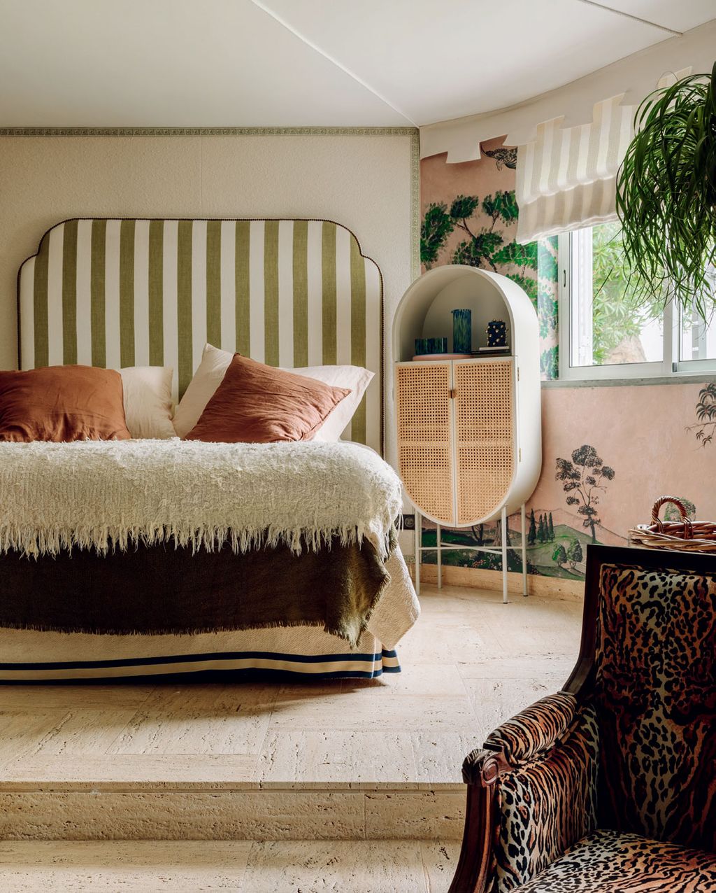 Image may contain Room Indoors Furniture Bedroom Living Room Flooring Crib Wood Interior Design and Dorm Room