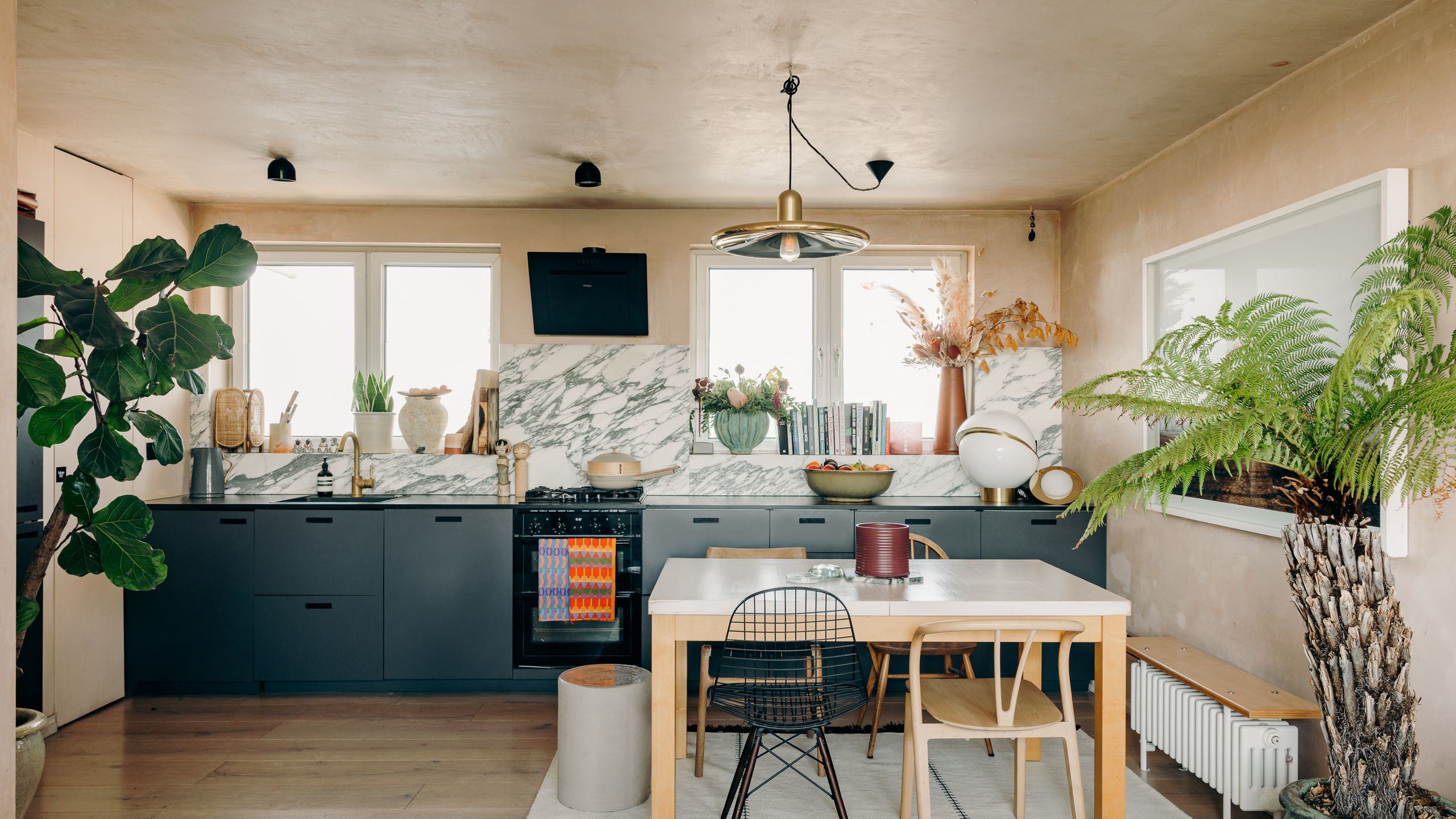 Image may contain Room Indoors Interior Design Kitchen Living Room Furniture and Chair