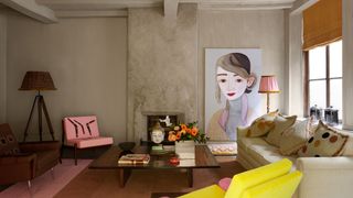 Image may contain Living Room Room Indoors Furniture Couch Table Interior Design and Coffee Table