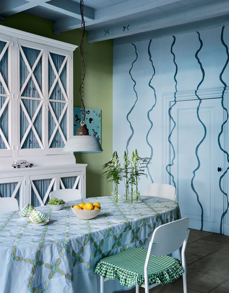 Image may contain Furniture Chair Home Decor Tablecloth Interior Design Indoors and Room