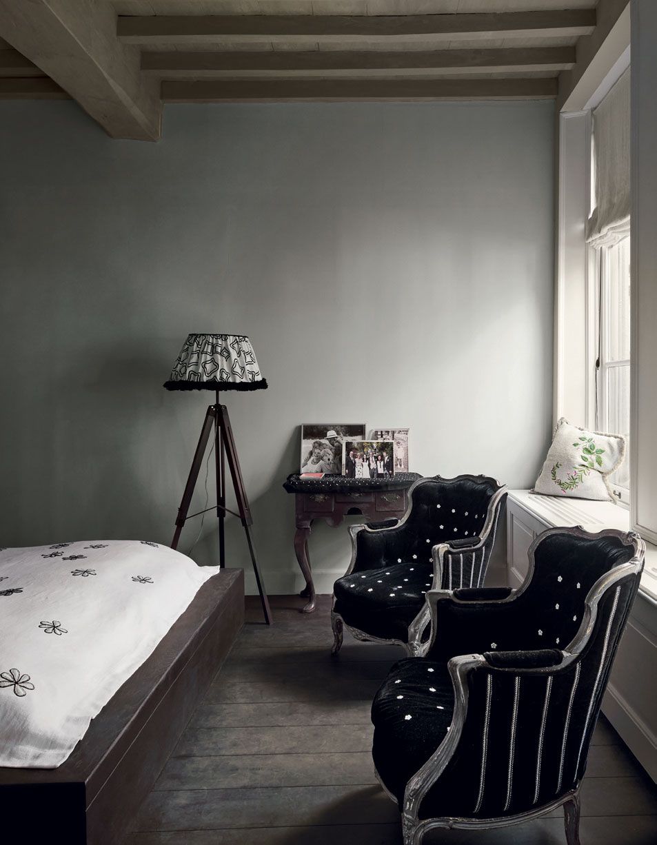 Image may contain Furniture Living Room Room Indoors Chair Couch Interior Design and Bedroom