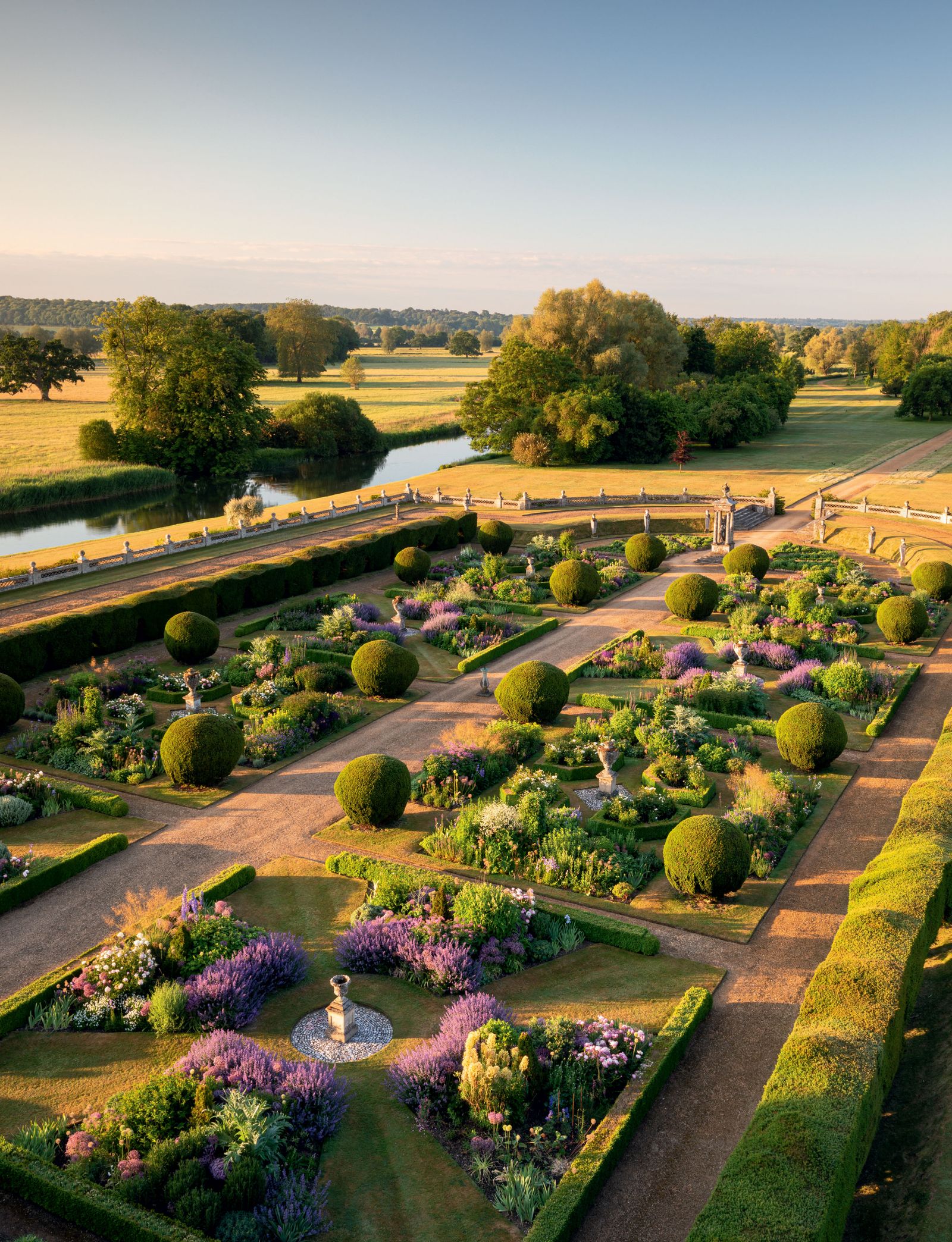 Image may contain Landscape Outdoors Nature Scenery Vegetation Plant Aerial View Grass Park Lawn Road and Campus