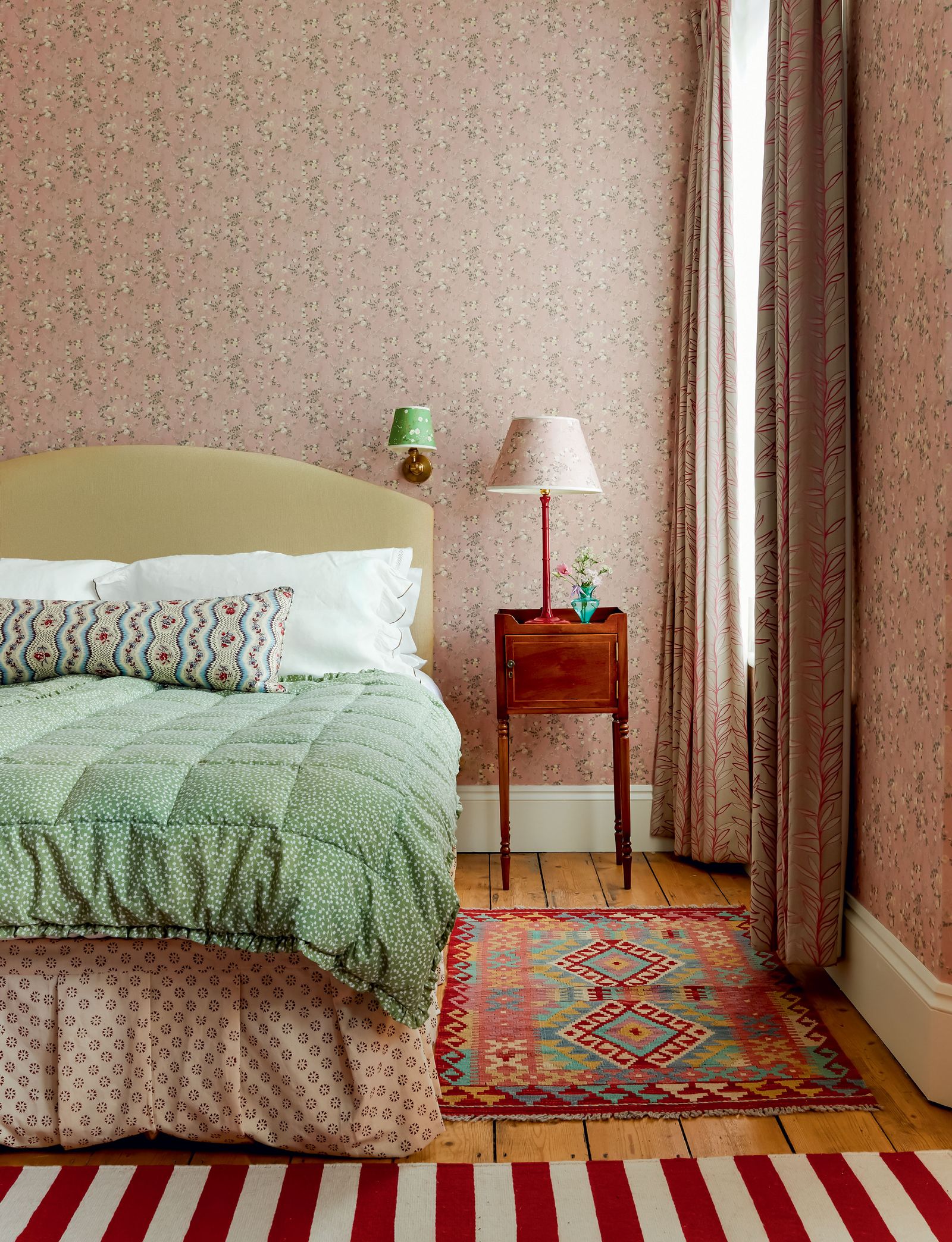 Image may contain Indoors Room Bedroom Furniture Bed Rug and Flooring