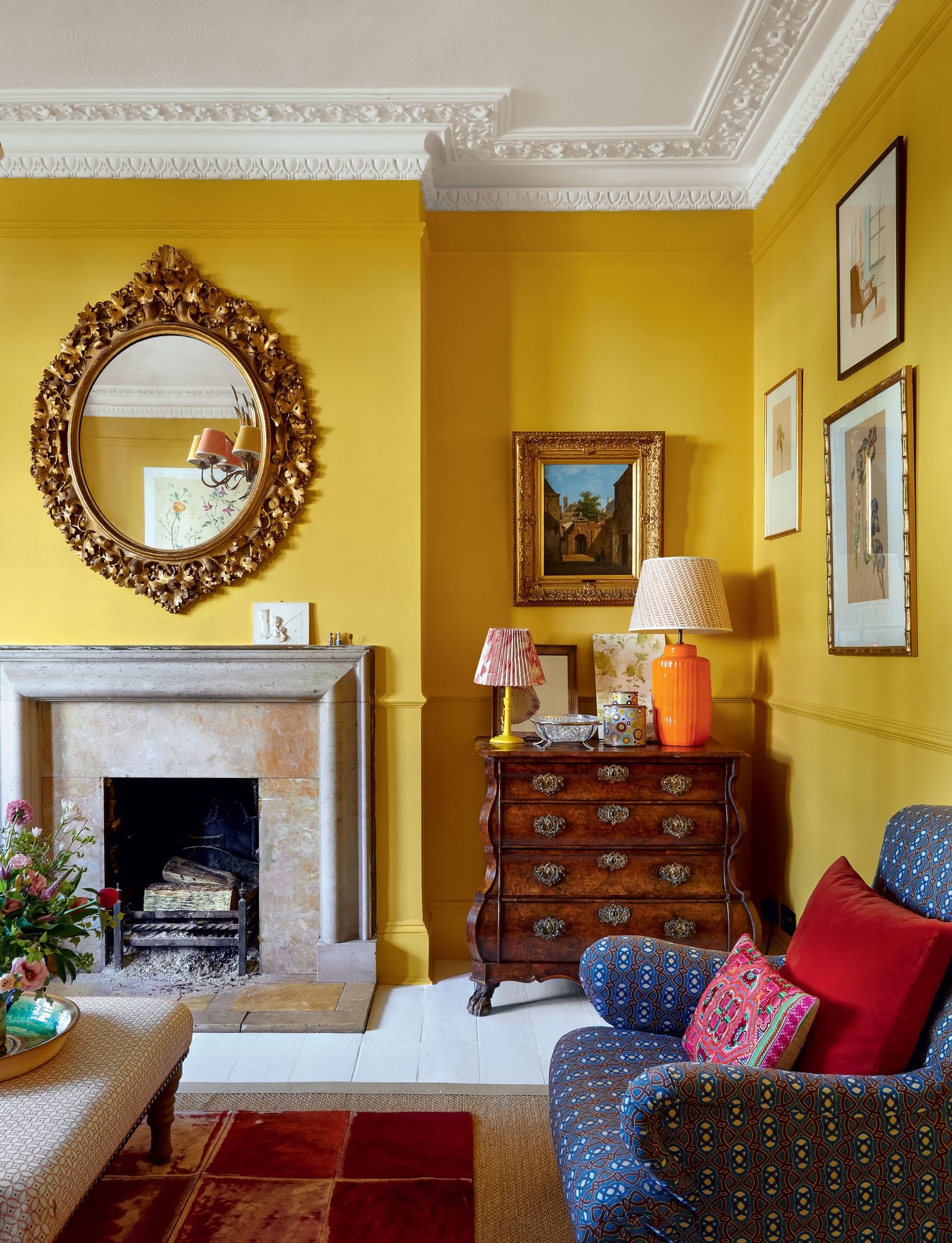 Image may contain Living Room Indoors Room Interior Design Furniture Couch Hearth Fireplace Cushion and Pillow