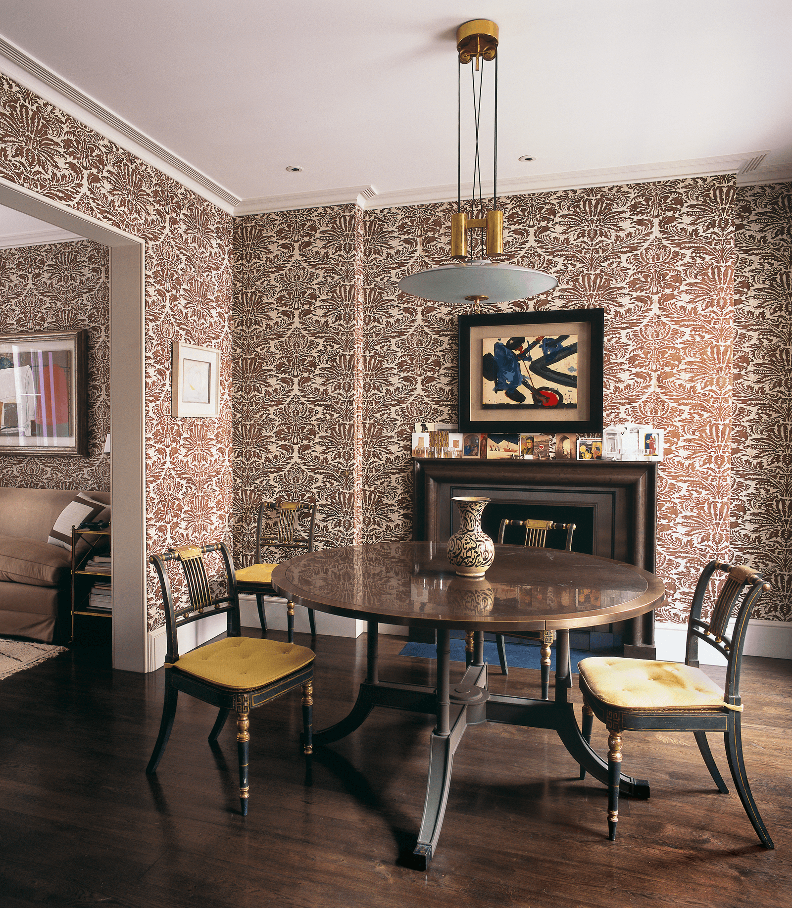 Image may contain Furniture Chair Flooring Wood Room Indoors Hardwood Living Room Dining Room and Interior Design