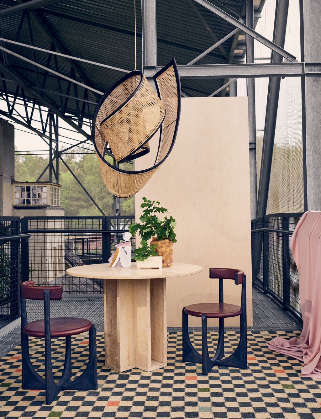 Image may contain Furniture Tabletop Table Rug and Balcony