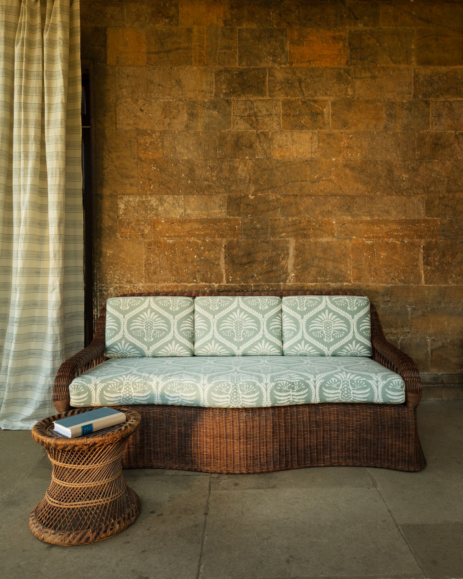 Image may contain Furniture Couch Home Decor Living Room Indoors and Room