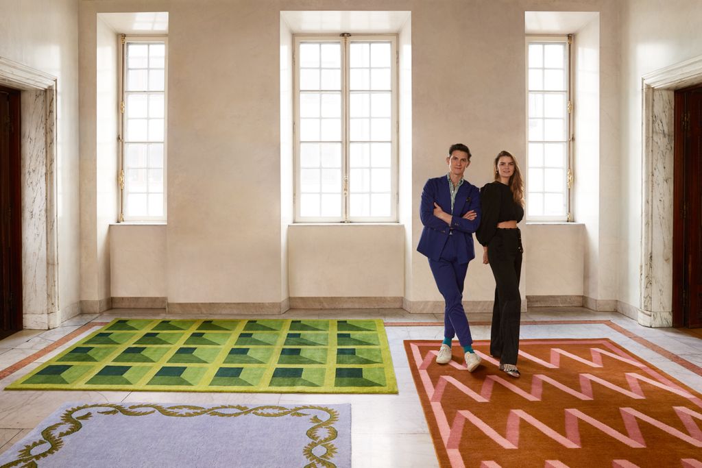 Image may contain Footwear Clothing Shoe Apparel Human Person Rug Indoors Interior Design Flooring Room and Floor