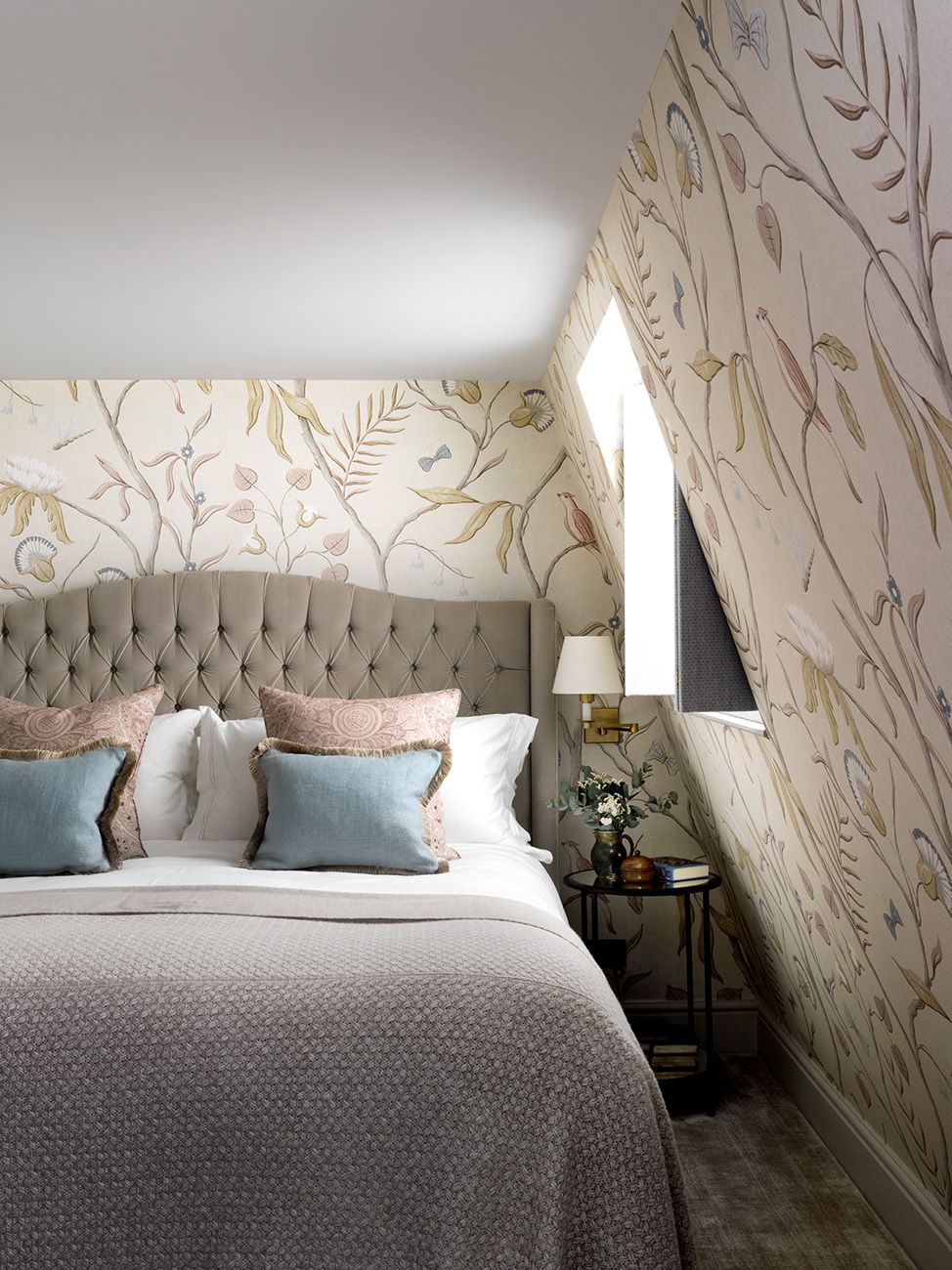 The wallpaper here is ‘Adams Eden in the shade Mother of Pearl from Lewis and Wood. The bed is the clients own.