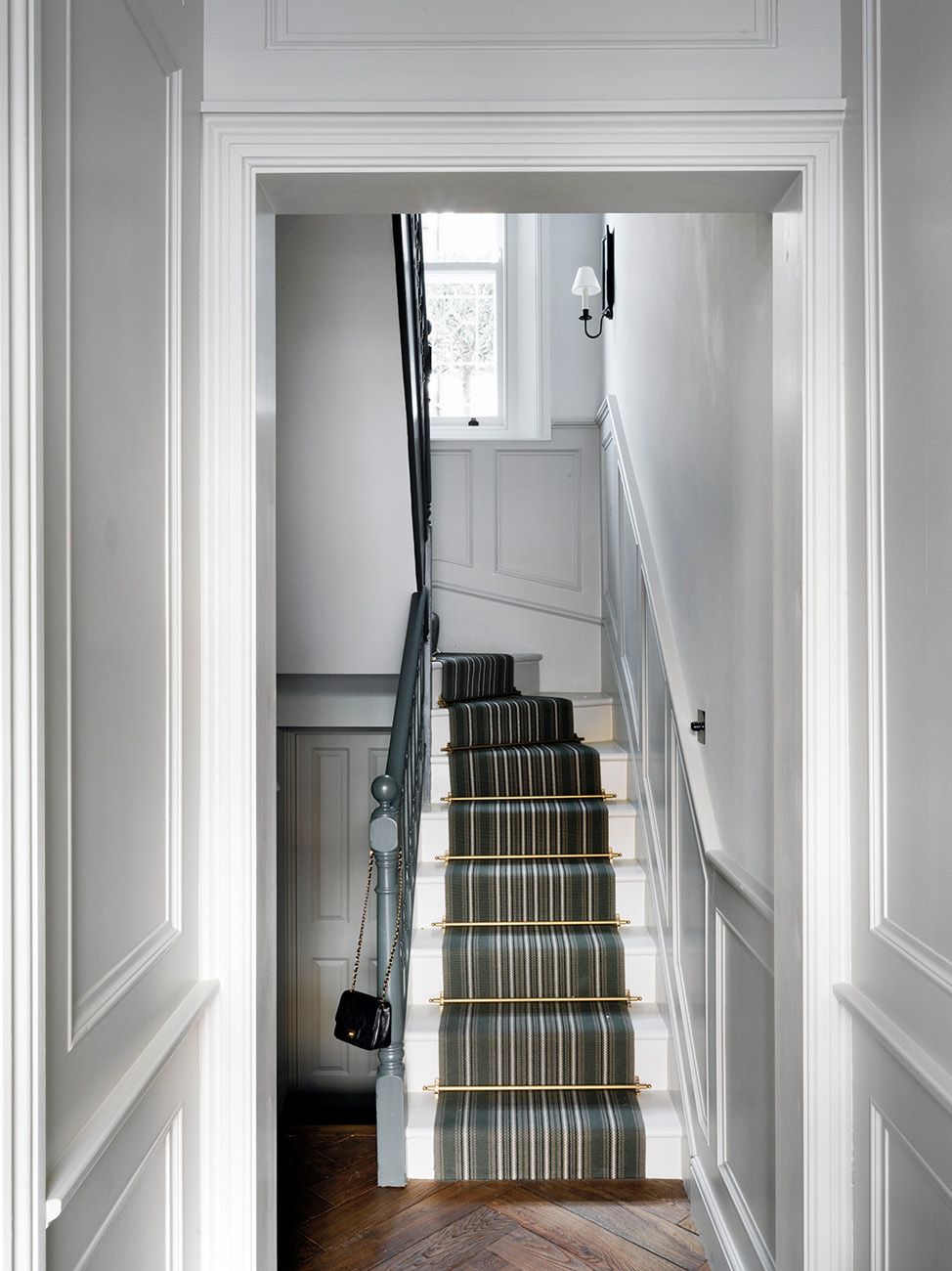 Image may contain Banister Handrail and Staircase