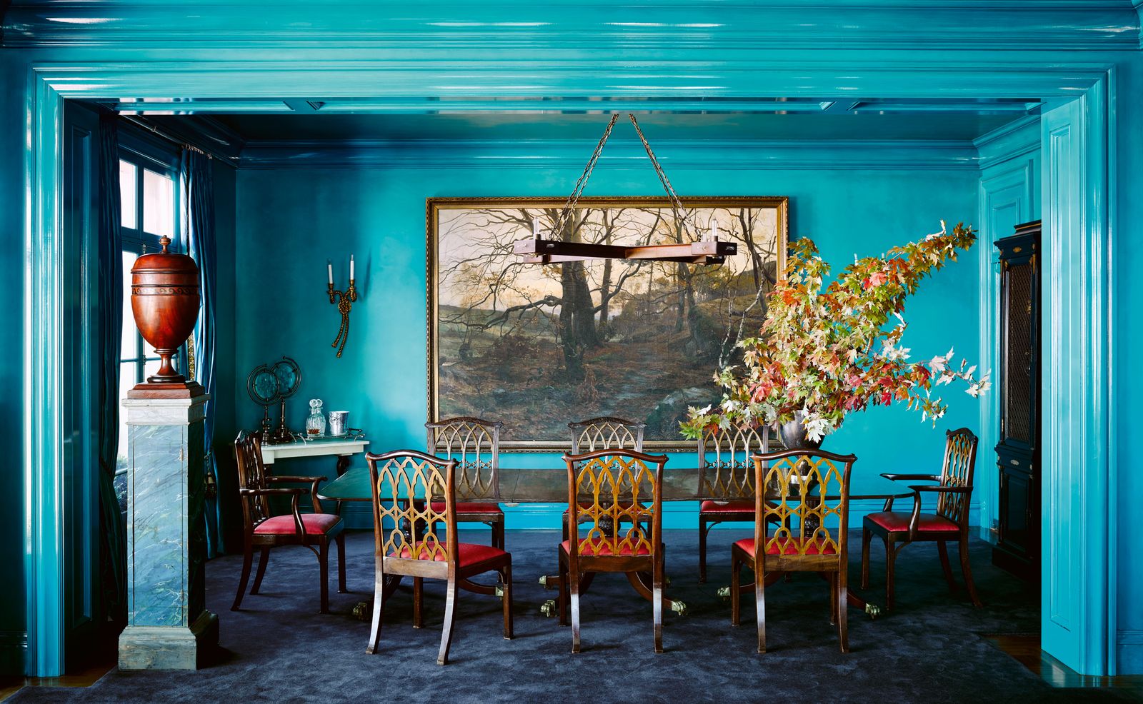 Image may contain Furniture Chair Plant Interior Design Indoors Flower Blossom Room Ikebana Ornament and Vase