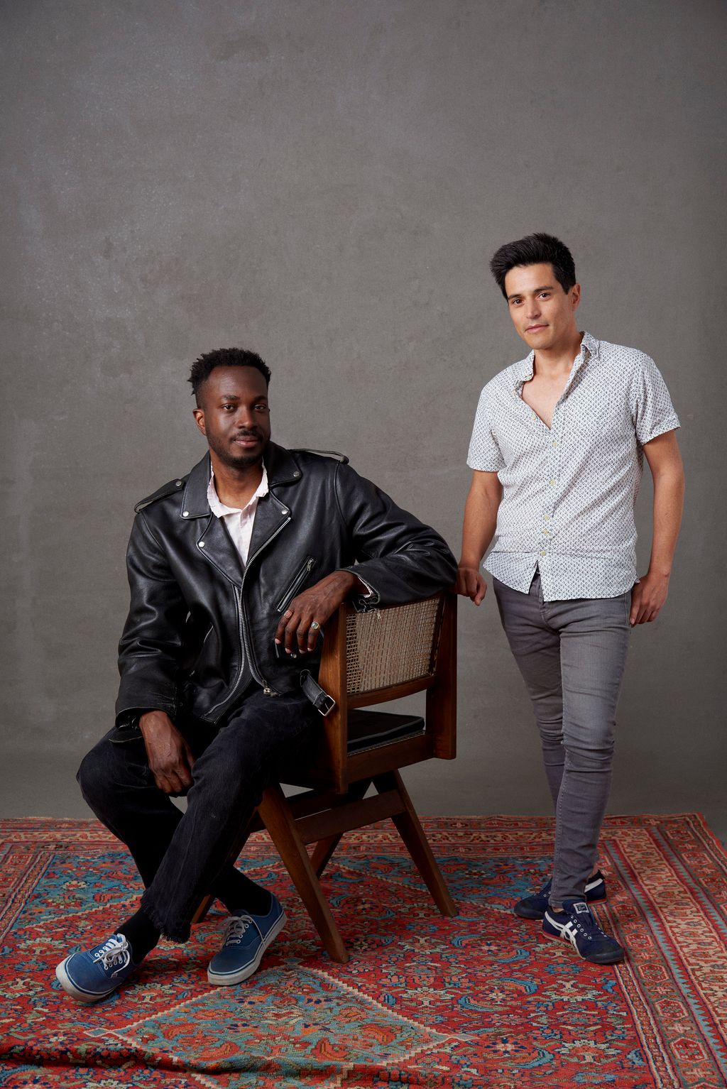 Image may contain Human Person Footwear Clothing Shoe Apparel Sitting Furniture Jacket Coat and Pants