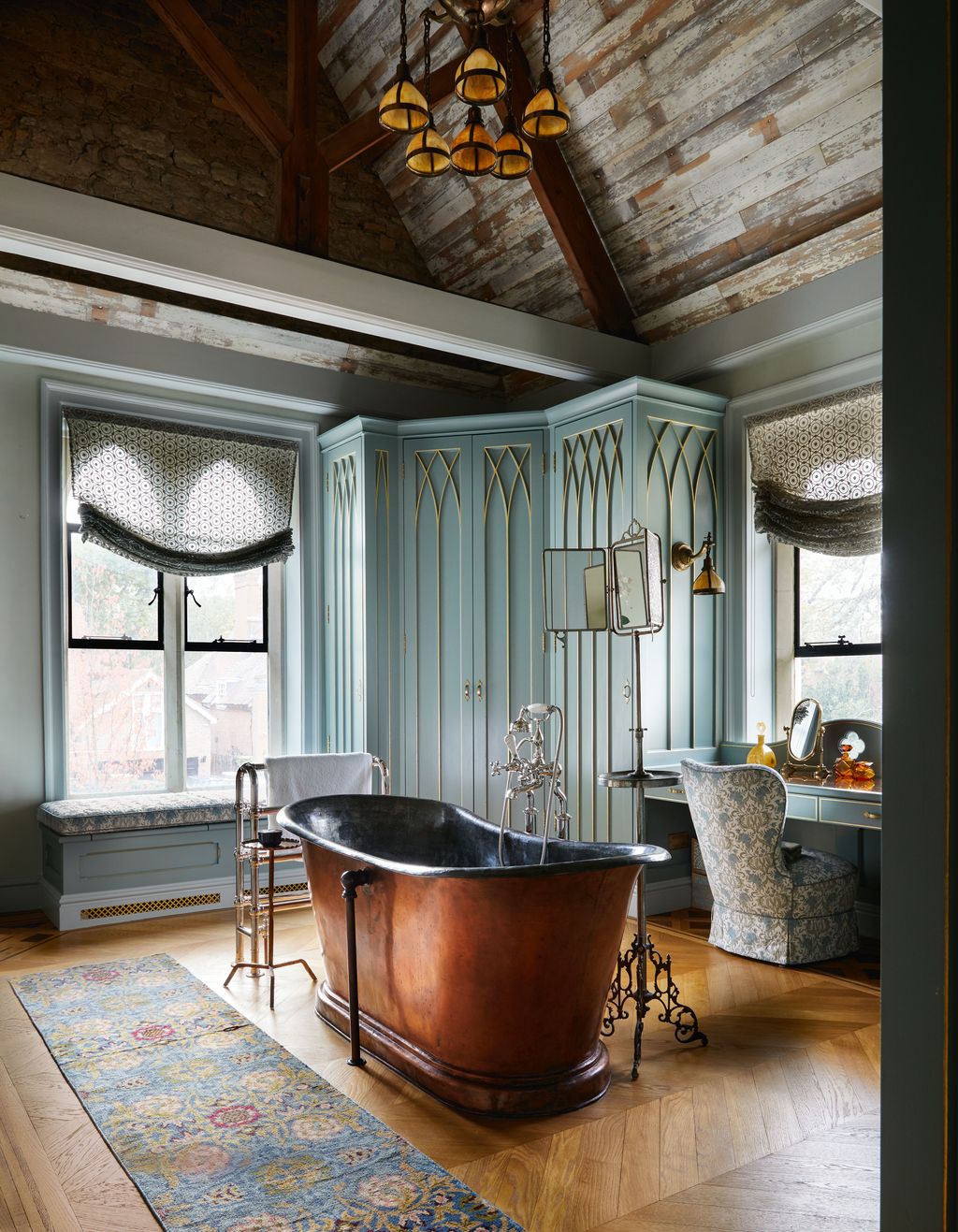 Image may contain Flooring Home Decor Furniture Living Room Room Indoors Wood Interior Design and Rug